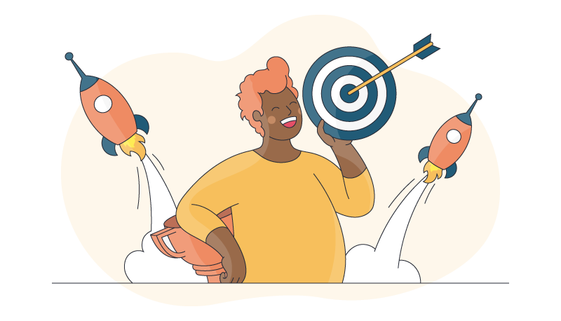 a person holds a trophy and a target with a bullseye as they set goals and succeed